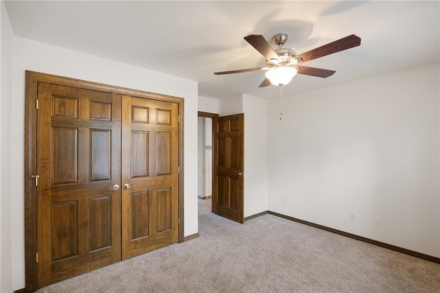 279 Eagle Cove Rd, Lamar, AR 72846 - unfurnished bedroom featuring carpet, baseboards, and a ceiling fan