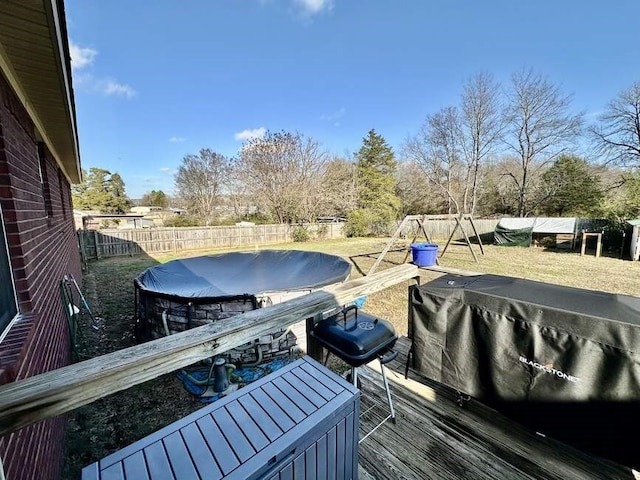 6011 River Rd, Pottsville, AR 72858 - wooden terrace featuring a fenced backyard and grilling area