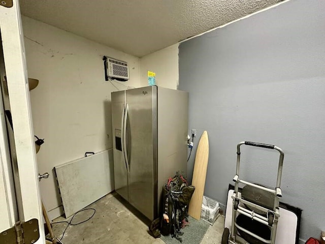 6011 River Rd, Pottsville, AR 72858 - miscellaneous room with concrete flooring and an AC wall unit