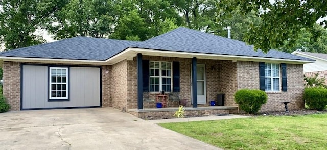 130 Willow Creek Dr, Dardanelle, AR 72834 - ranch-style house with a porch, a shingled roof, a front lawn, and brick siding