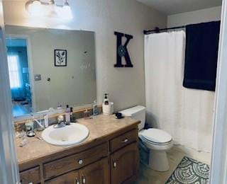 130 Willow Creek Dr, Dardanelle, AR 72834 - bathroom with vanity, toilet, and a shower with shower curtain