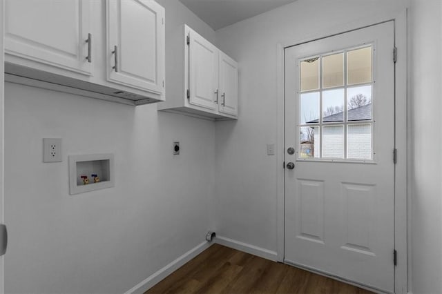 laundry area featuring hookup for an electric dryer, cabinet space, baseboards, dark wood-type flooring, and washer hookup