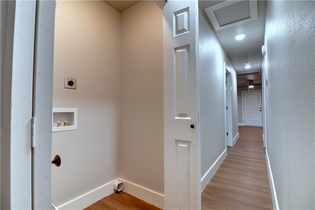 402 NE 4th Ave, Gravette, AR 72736 - washroom featuring hookup for an electric dryer, hookup for a washing machine, wood finished floors, and baseboards