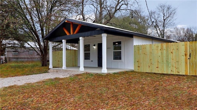 402 NE 4th Ave, Gravette, AR 72736 - view of outbuilding featuring covered porch