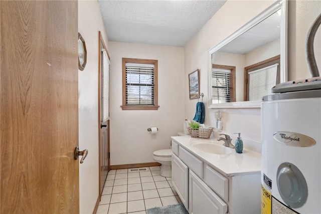 22965 Davis Valley Rd, Gentry, AR 72734 - bathroom featuring tile patterned floors, toilet, vanity, a textured ceiling, and electric water heater