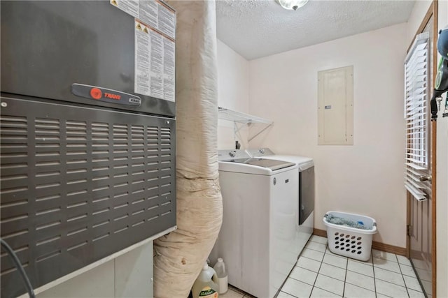 22965 Davis Valley Rd, Gentry, AR 72734 - laundry area with light tile patterned flooring, a textured ceiling, independent washer and dryer, electric panel, and heating unit