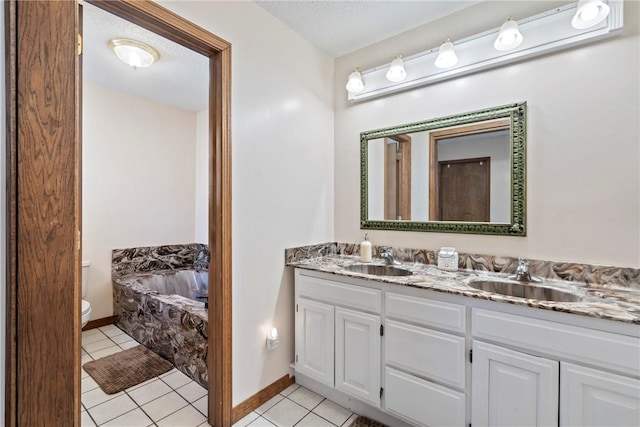 22965 Davis Valley Rd, Gentry, AR 72734 - bathroom with double vanity, a sink, toilet, and tile patterned flooring