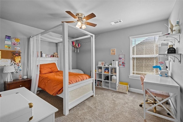 4204 SW Wheatgrass Blvd, Bentonville, AR 72713 - bedroom with a ceiling fan, carpet flooring, and baseboards
