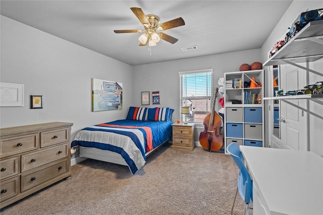 4204 SW Wheatgrass Blvd, Bentonville, AR 72713 - carpeted bedroom featuring a ceiling fan and baseboards