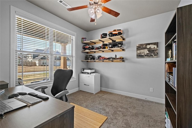 4204 SW Wheatgrass Blvd, Bentonville, AR 72713 - home office with baseboards, ceiling fan, and light colored carpet