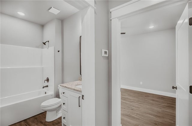 9 Beaty Ln, Bella Vista, AR 72715 - bathroom with vanity, recessed lighting, shower / bath combination, toilet, and wood finished floors