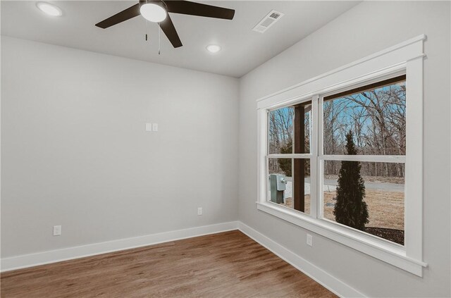 9 Beaty Ln, Bella Vista, AR 72715 - unfurnished room featuring visible vents, baseboards, ceiling fan, recessed lighting, and wood finished floors