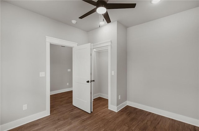 9 Beaty Ln, Bella Vista, AR 72715 - unfurnished bedroom with a closet, baseboards, ceiling fan, and wood finished floors