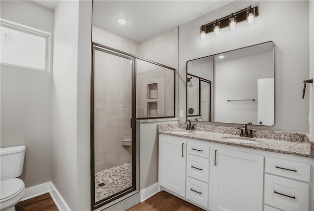 9 Beaty Ln, Bella Vista, AR 72715 - full bathroom with toilet, a stall shower, double vanity, and a sink