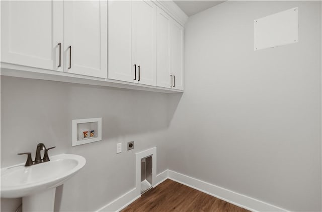 9 Beaty Ln, Bella Vista, AR 72715 - laundry room featuring hookup for a washing machine, electric dryer hookup, a sink, baseboards, and cabinet space