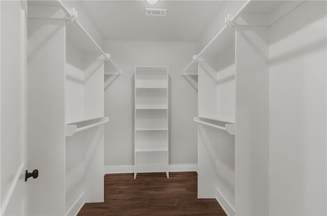 9 Beaty Ln, Bella Vista, AR 72715 - spacious closet with visible vents and wood finished floors