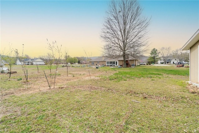 11300 Spring Mountain Dr, Farmington, AR 72730 - view of yard at dusk