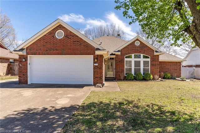 ranch-style house featuring a front lawn, concrete driveway, fence, brick siding, and a garage