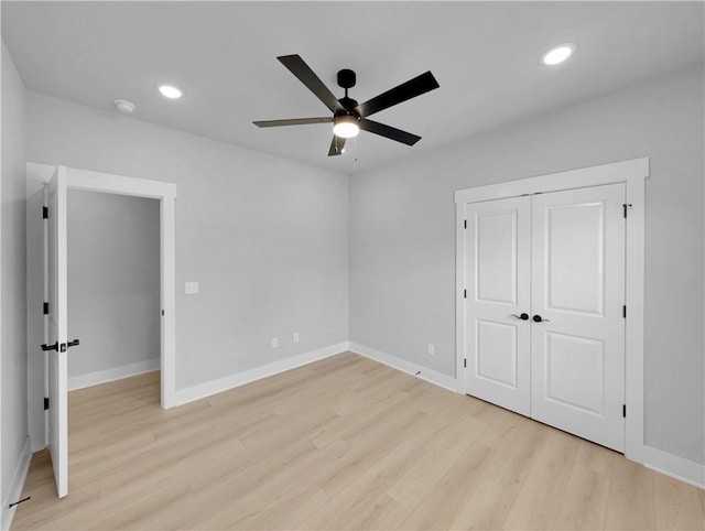 6 Osborne Ln, Bella Vista, AR 72715 - unfurnished bedroom with light wood-style flooring, baseboards, recessed lighting, a ceiling fan, and a closet