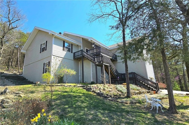 1401 Vickie Cir, Berryville, AR 72616 - view of home's exterior with stairs, a yard, and a wooden deck