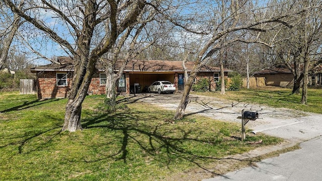 5694/925668/665644/42 W Michael Cole Dr, Fayetteville, AR 72704 - single story home featuring fence, driveway, a front lawn, brick siding, and a carport