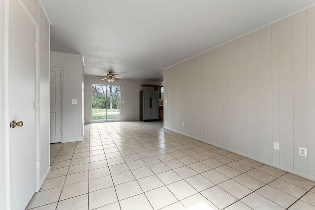 5694/925668/665644/42 W Michael Cole Dr, Fayetteville, AR 72704 - empty room featuring light tile patterned floors and a ceiling fan