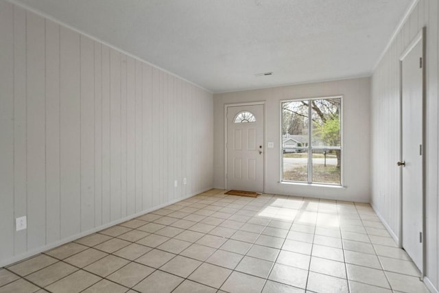 5694/925668/665644/42 W Michael Cole Dr, Fayetteville, AR 72704 - foyer entrance with ornamental molding, visible vents, and light tile patterned floors