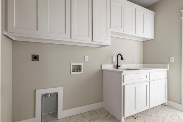 7 Boreray Ln, Bella Vista, AR 72715 - clothes washing area with light marble finish floors, hookup for a washing machine, electric dryer hookup, cabinet space, and baseboards