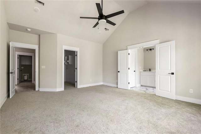 7 Boreray Ln, Bella Vista, AR 72715 - unfurnished bedroom with high vaulted ceiling, carpet floors, a spacious closet, and ensuite bathroom