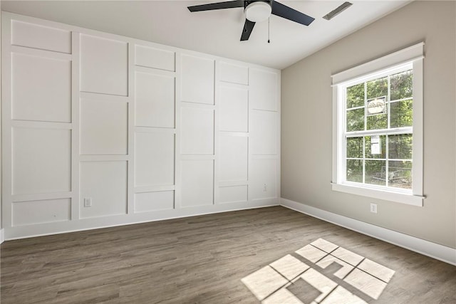 7 Boreray Ln, Bella Vista, AR 72715 - unfurnished bedroom with wood finished floors and ceiling fan