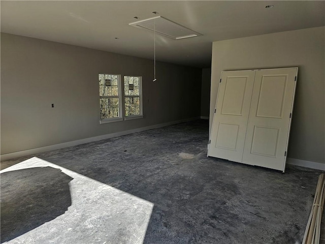 7 Boreray Ln, Bella Vista, AR 72715 - unfurnished room featuring attic access, unfinished concrete floors, and baseboards
