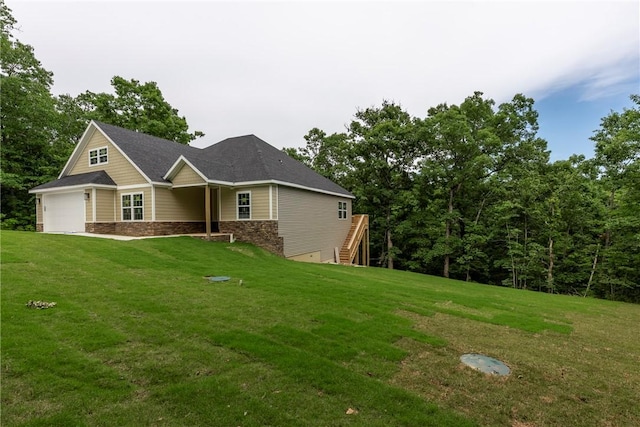 7 Boreray Ln, Bella Vista, AR 72715 - view of front facade with stone siding, a front yard, and a garage