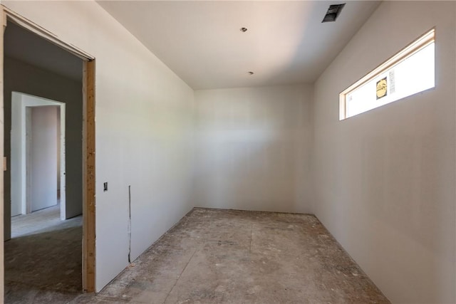 spare room featuring visible vents
