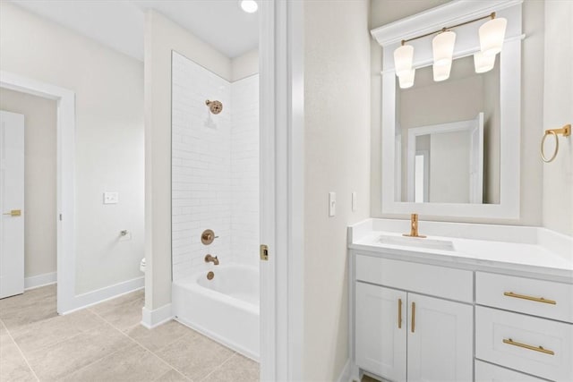 full bath with tile patterned floors, toilet, bathtub / shower combination, baseboards, and vanity