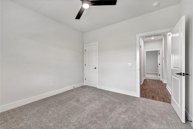 98 N Banner Ave, Farmington, AR 72730 - unfurnished bedroom with carpet flooring, baseboards, and ceiling fan