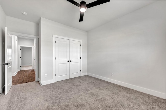 98 N Banner Ave, Farmington, AR 72730 - unfurnished bedroom with carpet flooring, baseboards, a closet, and ceiling fan