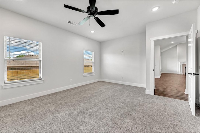98 N Banner Ave, Farmington, AR 72730 - unfurnished bedroom with carpet floors, recessed lighting, baseboards, and a ceiling fan