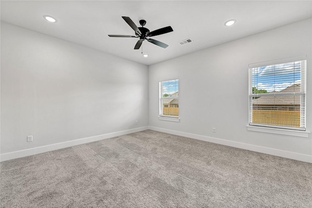 98 N Banner Ave, Farmington, AR 72730 - carpeted empty room with healthy amount of natural light, baseboards, and recessed lighting