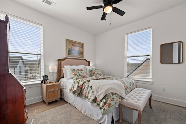 845 One Mile Rd, Fayetteville, AR 72704 - bedroom with multiple windows and baseboards