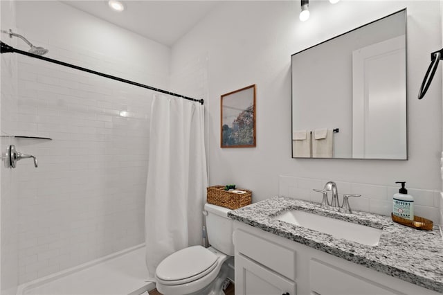 845 One Mile Rd, Fayetteville, AR 72704 - full bath featuring toilet, vanity, a shower stall, and tasteful backsplash