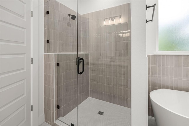 13040 Seba Rd, Centerton, AR 72719 - full bath featuring a shower stall and a soaking tub