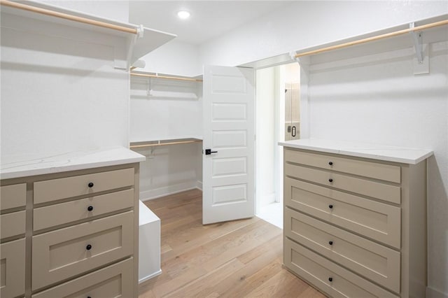 13040 Seba Rd, Centerton, AR 72719 - spacious closet featuring light wood-type flooring