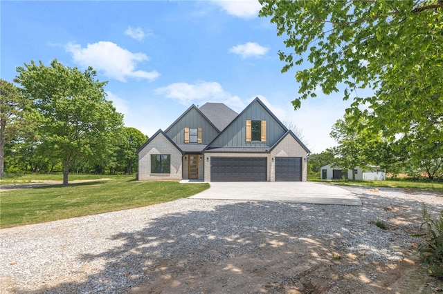 13040 Seba Rd, Centerton, AR 72719 - modern inspired farmhouse with concrete driveway, brick siding, a front yard, and board and batten siding