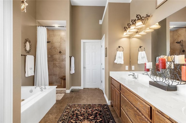 full bath featuring a bath, baseboards, a tile shower, tile patterned floors, and vanity