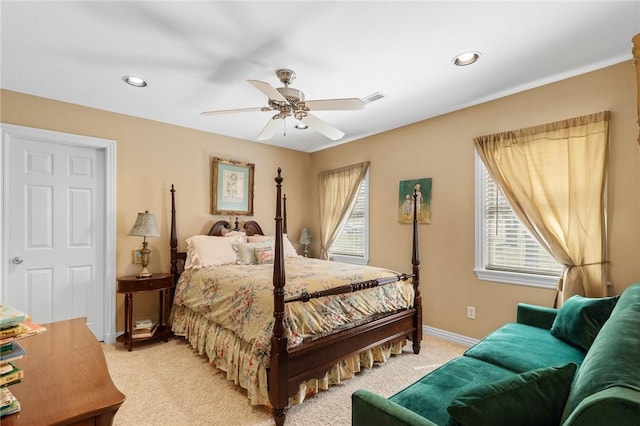 bedroom with recessed lighting, baseboards, ceiling fan, visible vents, and light carpet