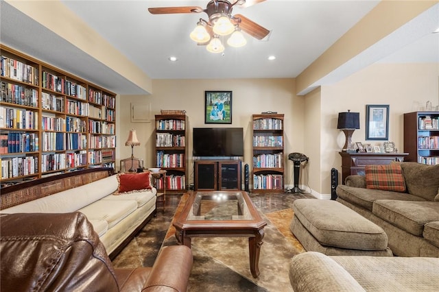 living room with baseboards, recessed lighting, and a ceiling fan