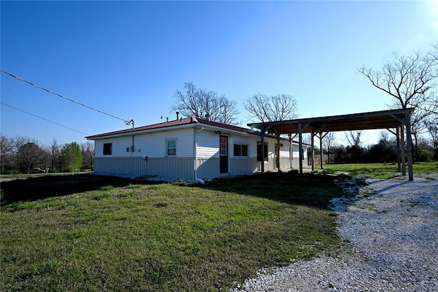 12766 Rocky Hill Rd, Prairie Grove, AR 72753 - view of side of home featuring driveway and a yard