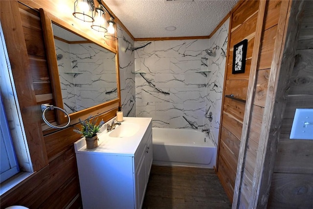 12766 Rocky Hill Rd, Prairie Grove, AR 72753 - bathroom with a textured ceiling, crown molding, wood finished floors, vanity, and shower / bathing tub combination