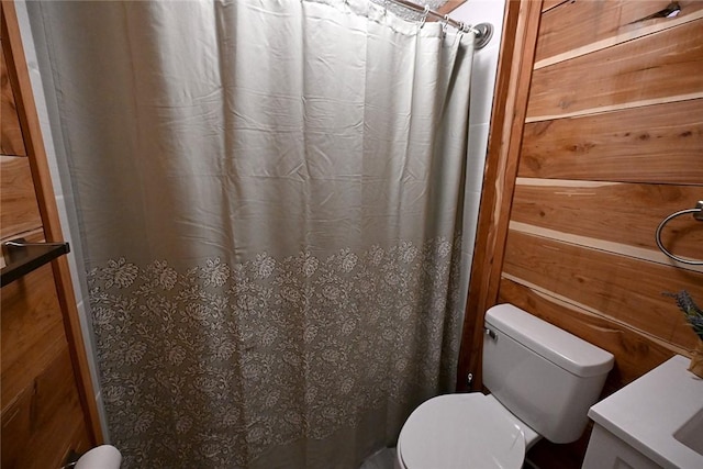 12766 Rocky Hill Rd, Prairie Grove, AR 72753 - full bath featuring toilet, a shower with shower curtain, and wooden walls