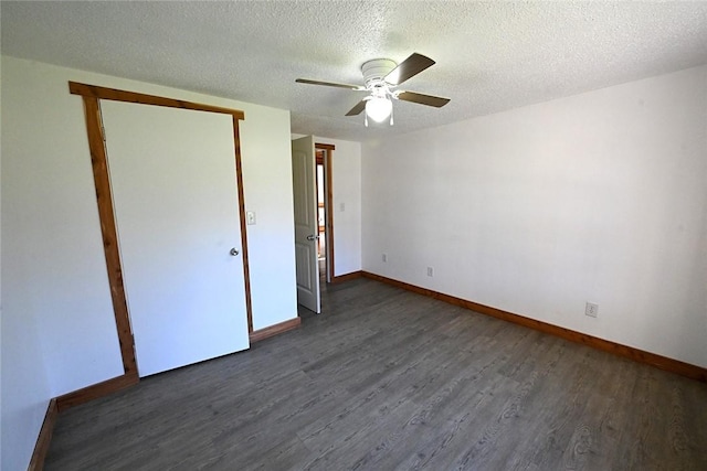 12766 Rocky Hill Rd, Prairie Grove, AR 72753 - unfurnished bedroom with baseboards, wood finished floors, and a textured ceiling